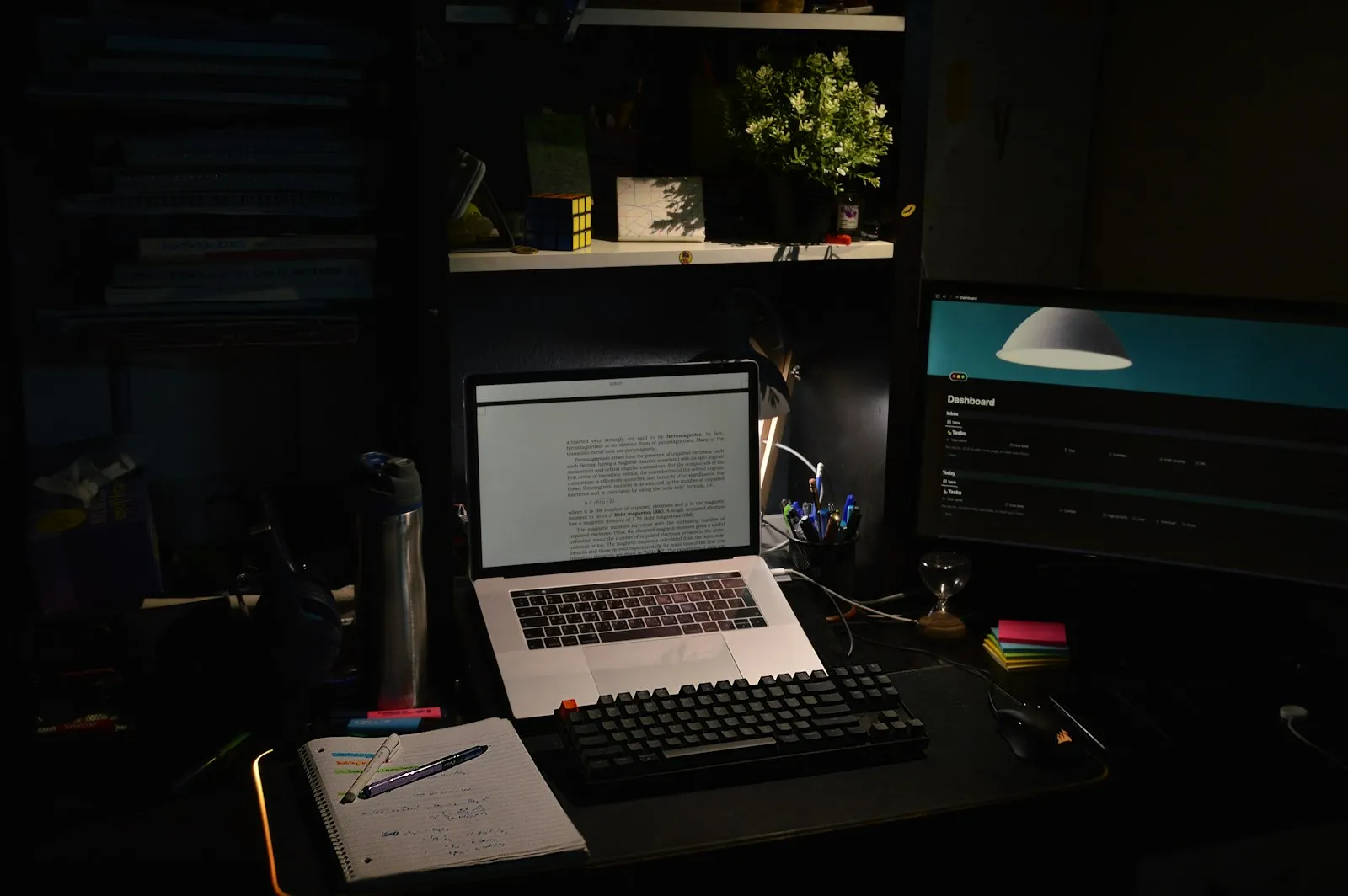 a laptop sits on a desk